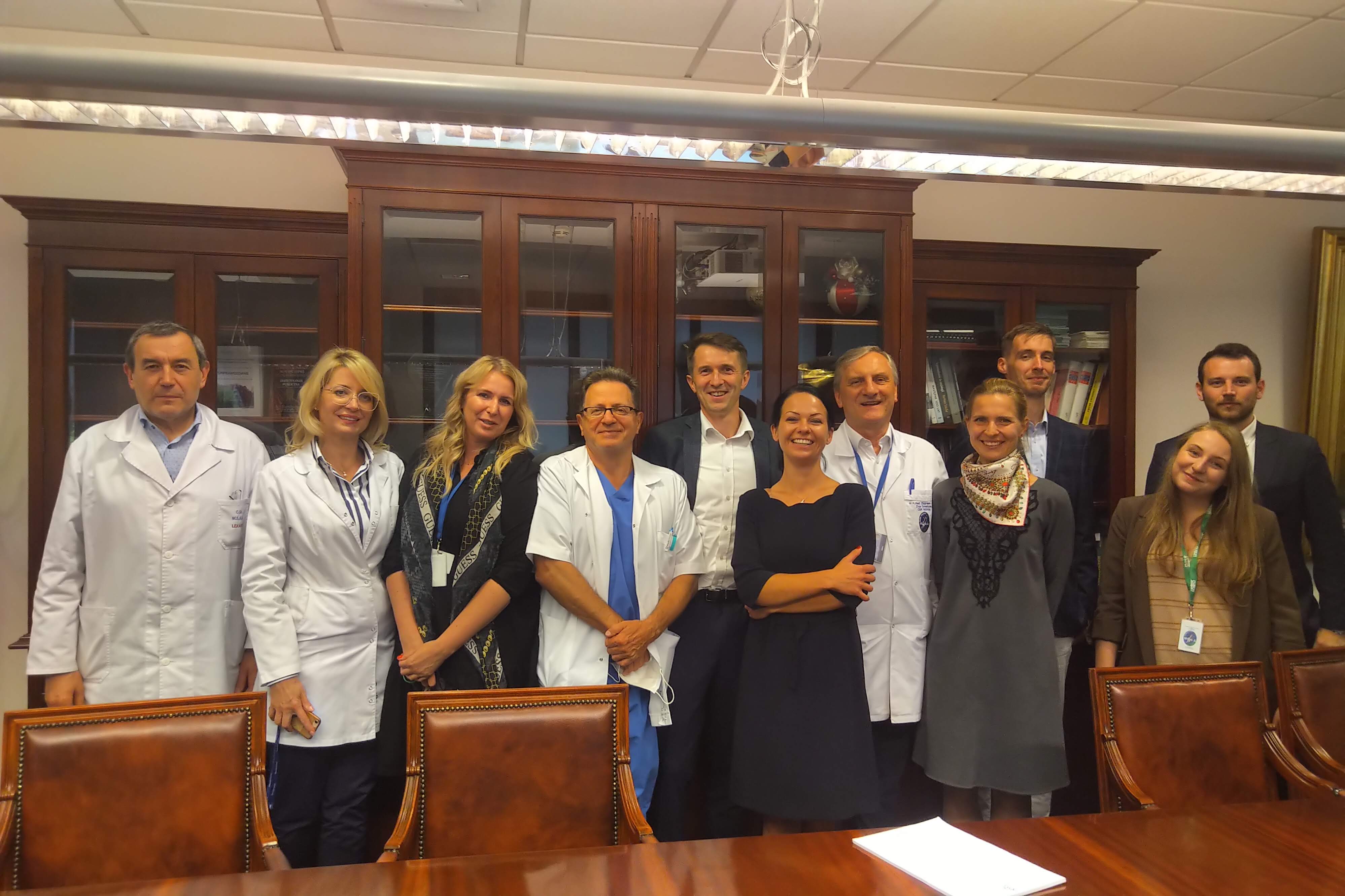 Annexed - a photo from the meeting summarizing the project, September 2021; in the photo, members of the team of the Central Clinical Hospital of the Ministry of Interior and Administration in Warsaw and of the partner - MNM Diagnostics from Poznań. 