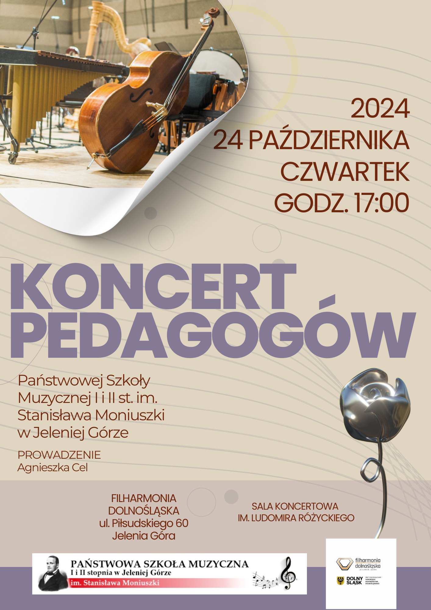 Plakat wydarzenia Koncert Pedagogów 24 października 2024 , godz. 17 sala im. Ludomira Różyckiego w Filharmonii Dolnośląskiej w Jeleniej Górze. Prowadzenie Agnieszka Cel. Plakat w barwach beżowych z fioletowymi i brązowymi napisami. w lewym górnym roku zdjęcie części sali koncertowej . W dolnym prawym rogu trójwymiarowa, pojedyncza, srebrna róża