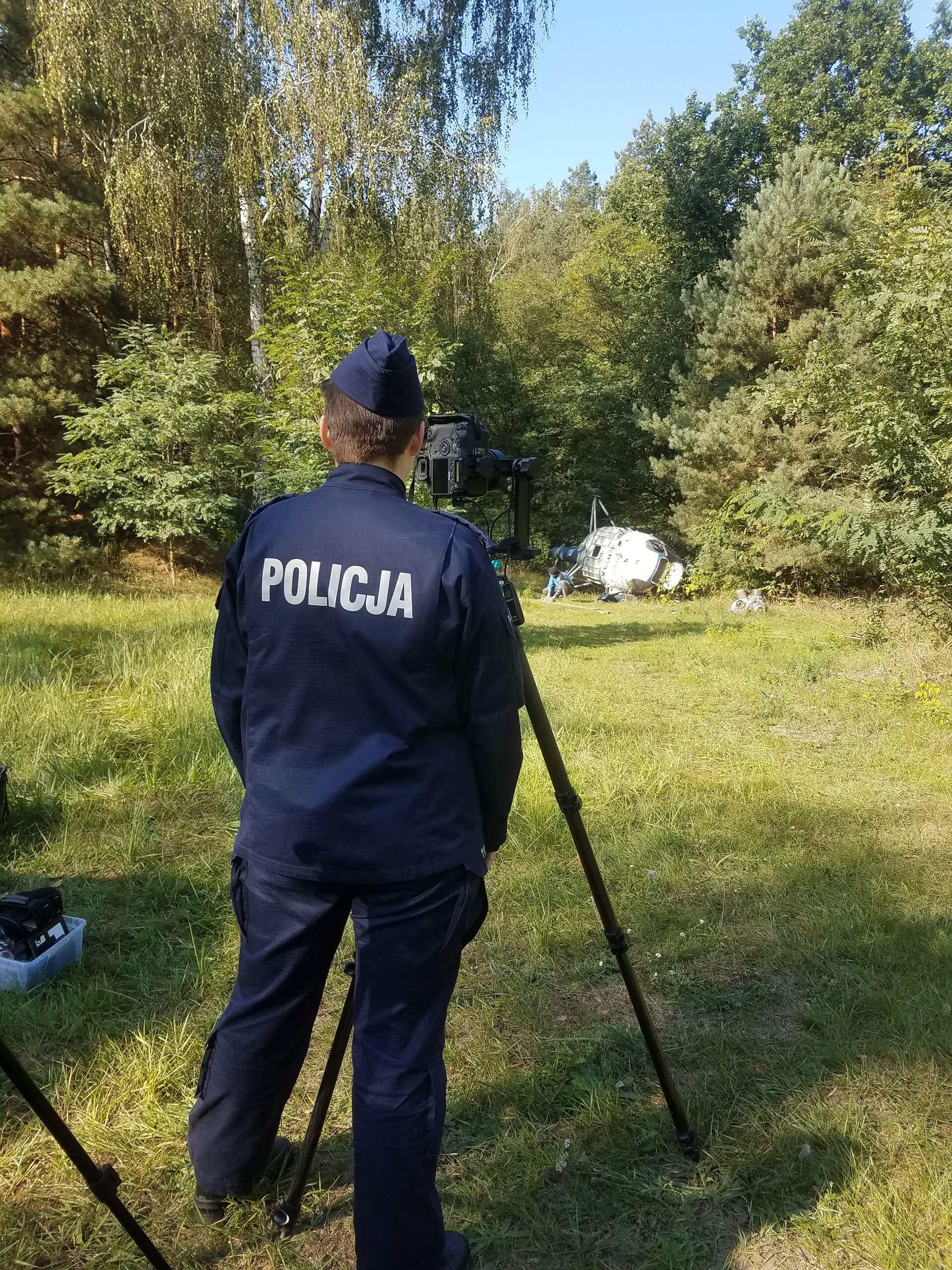 A policeman working at the helicopter crash site