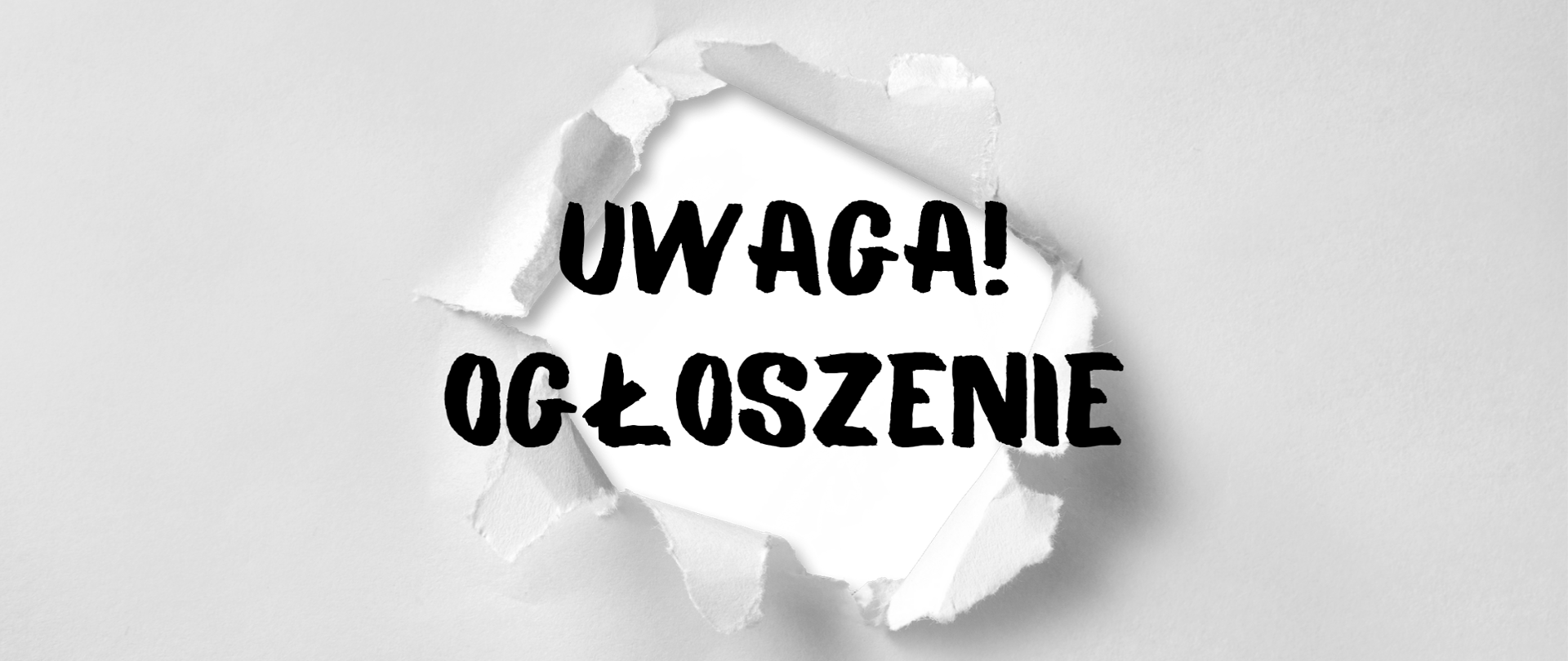 czarne napisy na biało szarym tle, w miejscu środkowym, imitującym wydartą dziurę w kartce