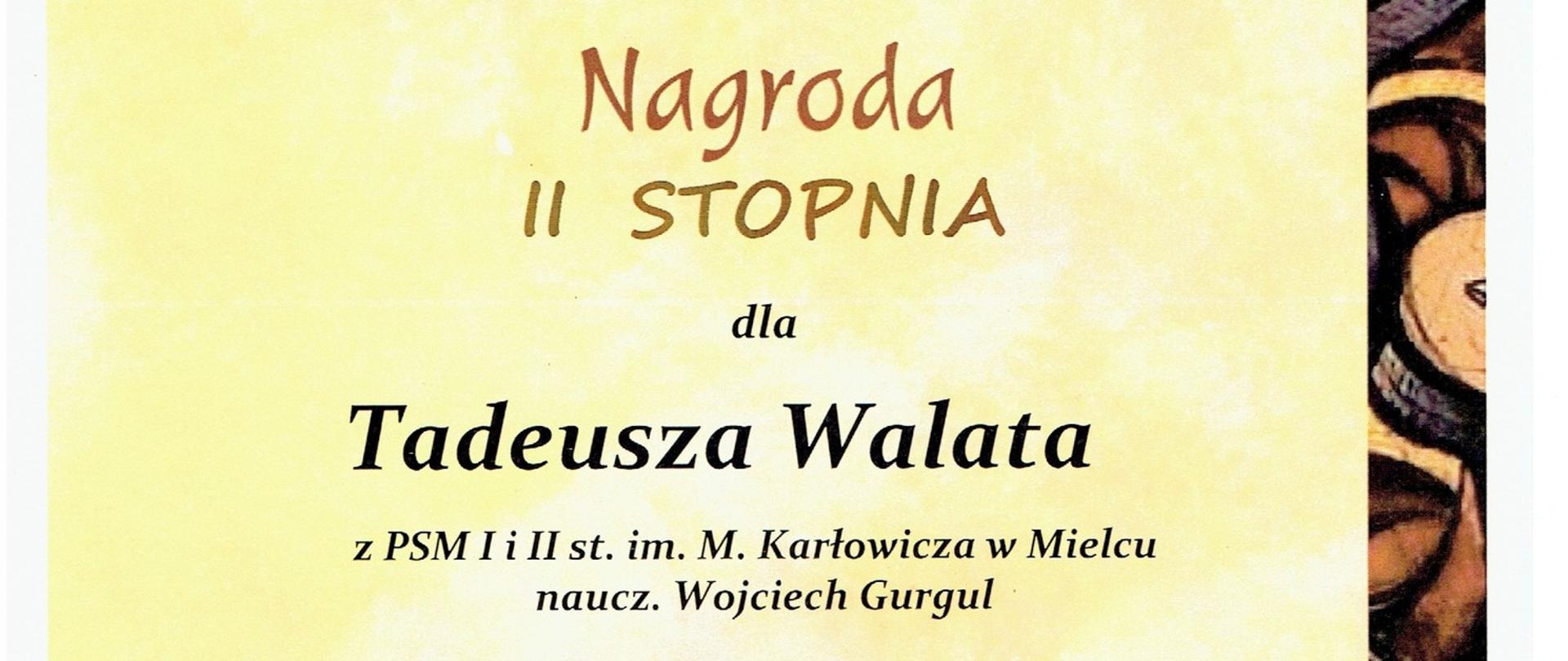 dyplom z czarnymi i brązowymi napisami na tle w żółtych odcieniach o treści Nagroda II stopnia dla Tadeusza Walata 