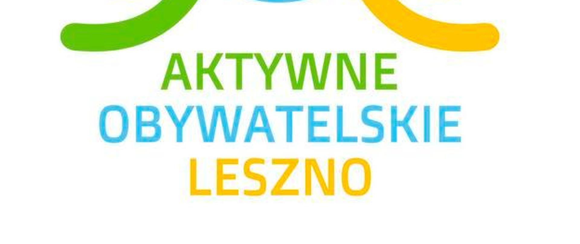 Kolorowe kulki i szlaczki oraz napis na białym tle.