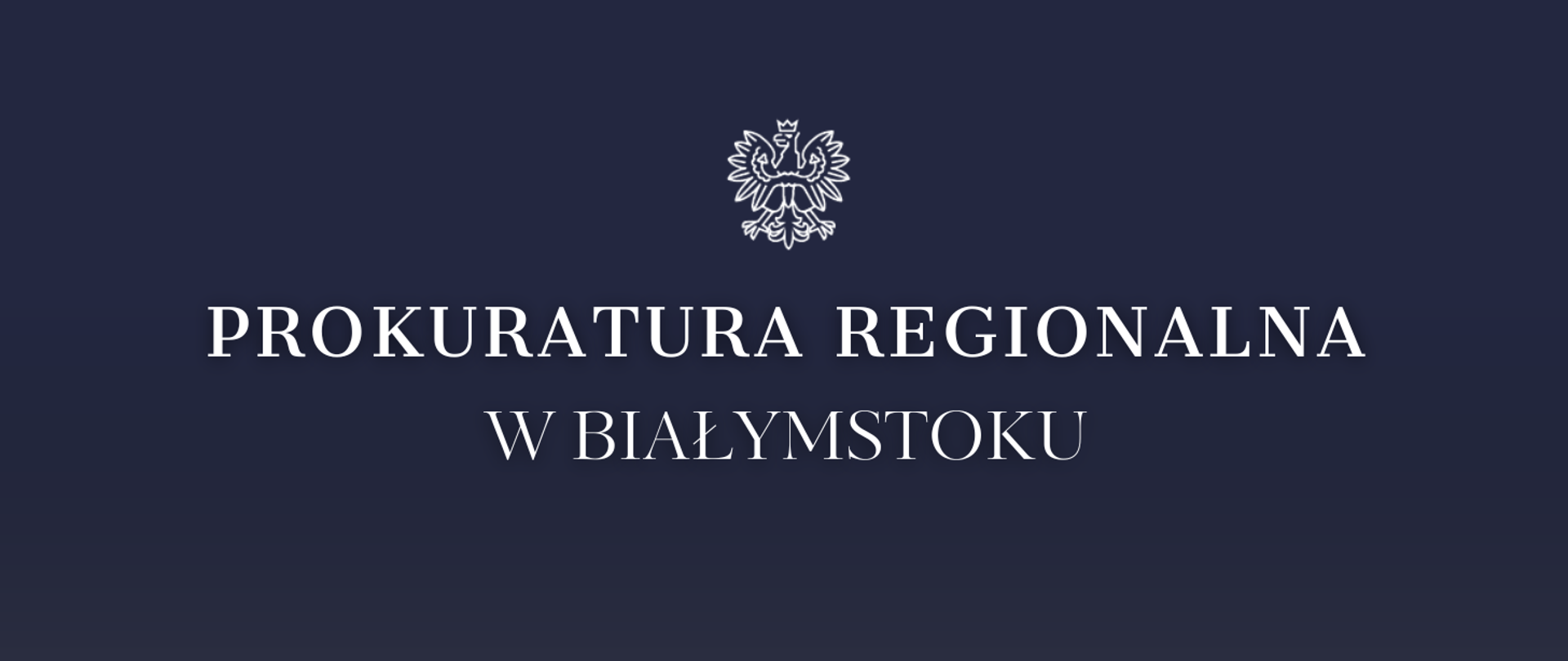 Na granatowym tle białe godło i biały napis Prokuratura Regionalna w Białymstoku