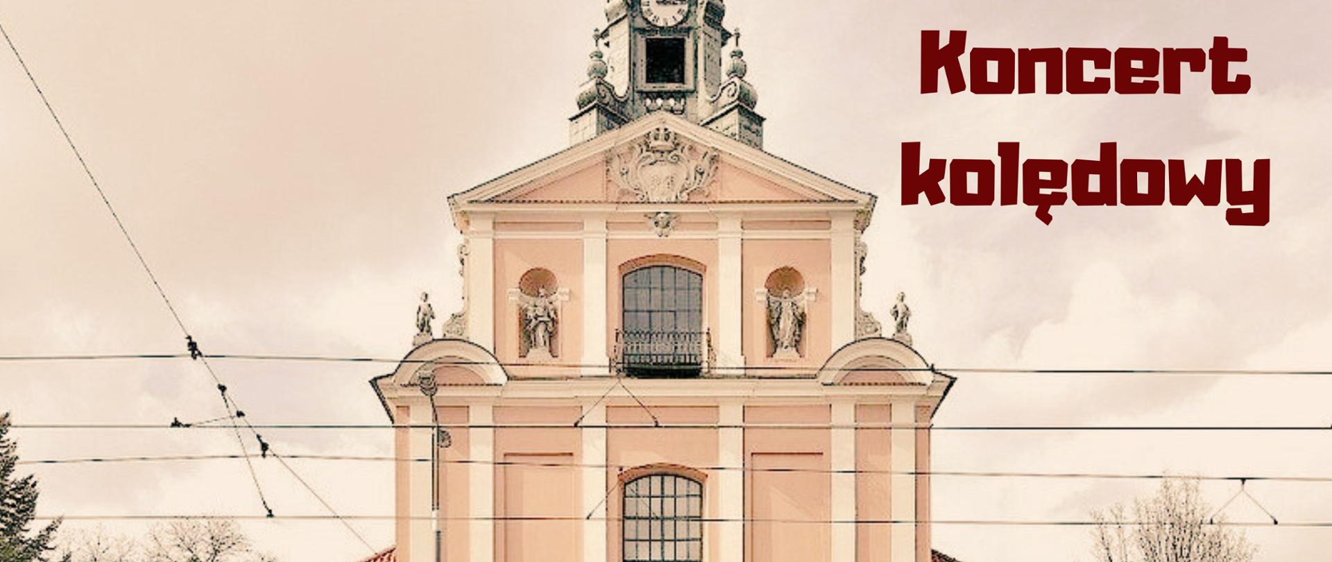 Baner na koncert kolędowy w beżowych kolorach przedstawia napis w kolorze brązowym oraz grafikę z wieżą kościelną