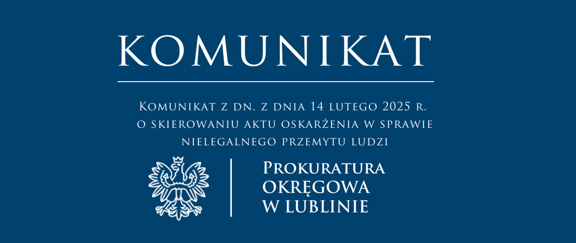 Niebieski baner o treści: "Komunikat z dn. 14.02.2025 r. o skierowaniu aktu oskarżenia w sprawie nielegalnego przemytu ludzi"