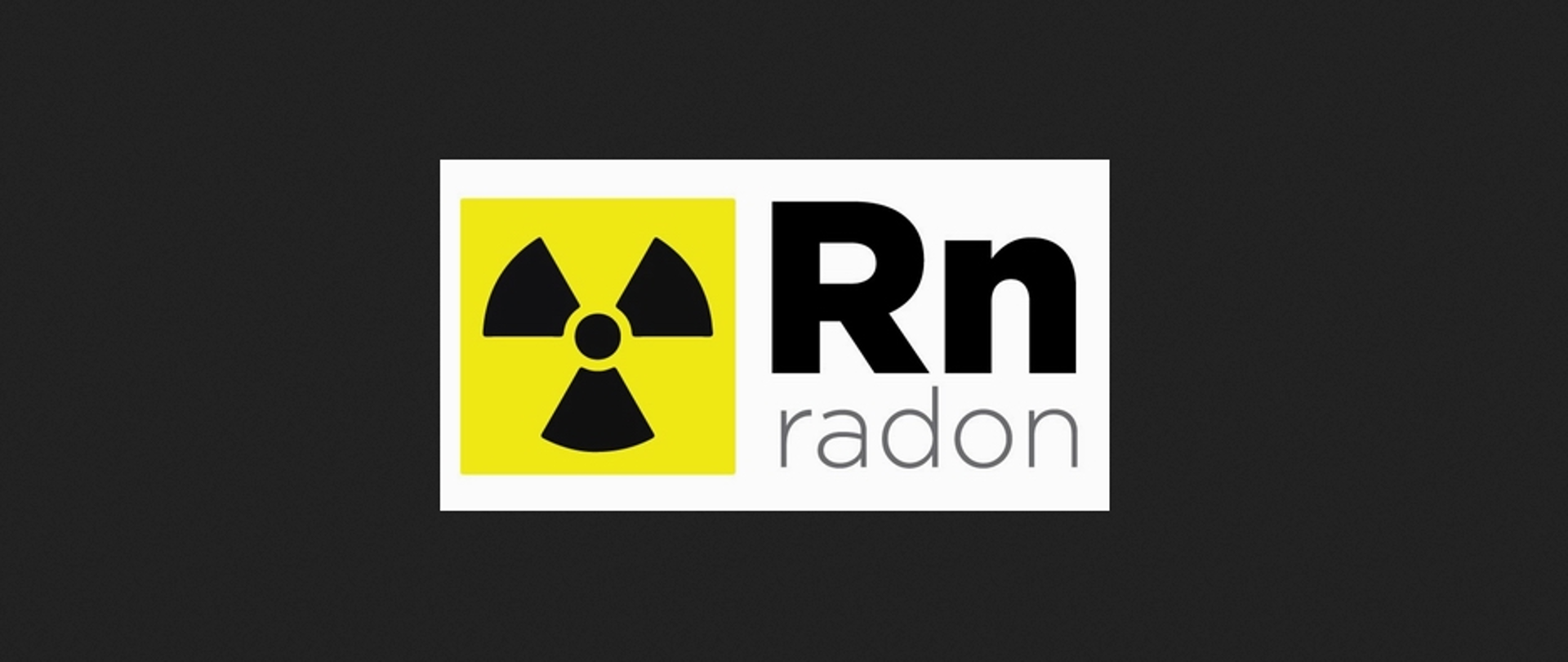 Grafika przedstawia znak radioaktywności. Tuż obok znajduje się symbol Rn oraz napis radon.