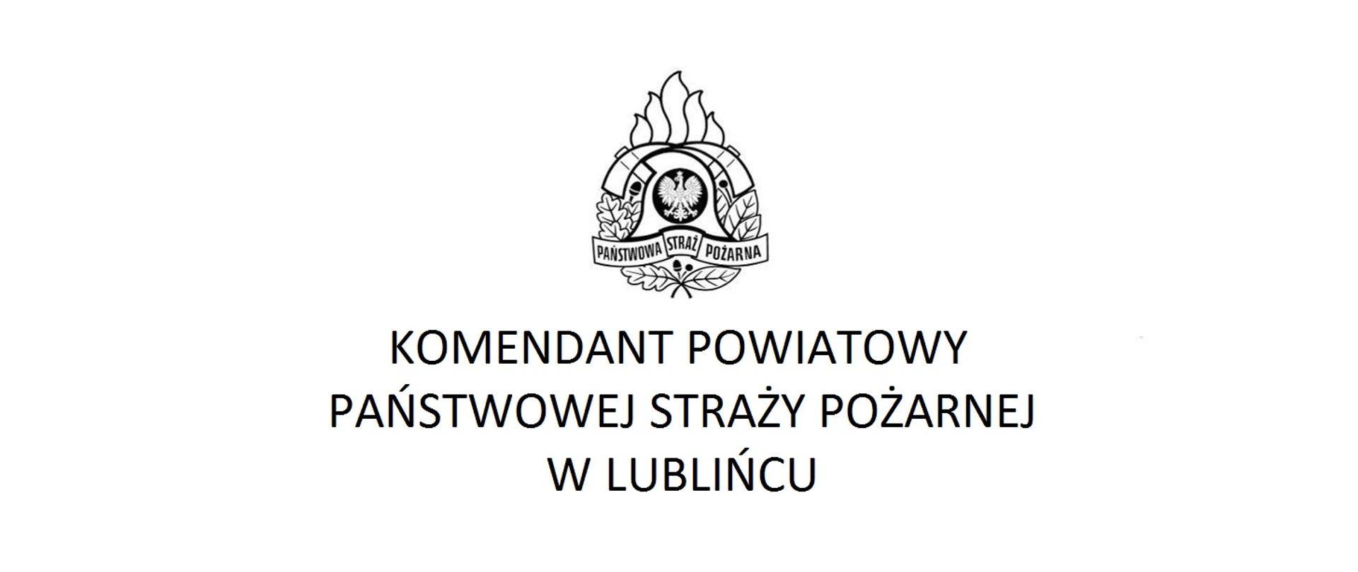 Baner z logo Państwowej Straży Pożarnej a pod nim napis Komendant Powiatowy Państwowej Straży Pożarnej w Lublińcu