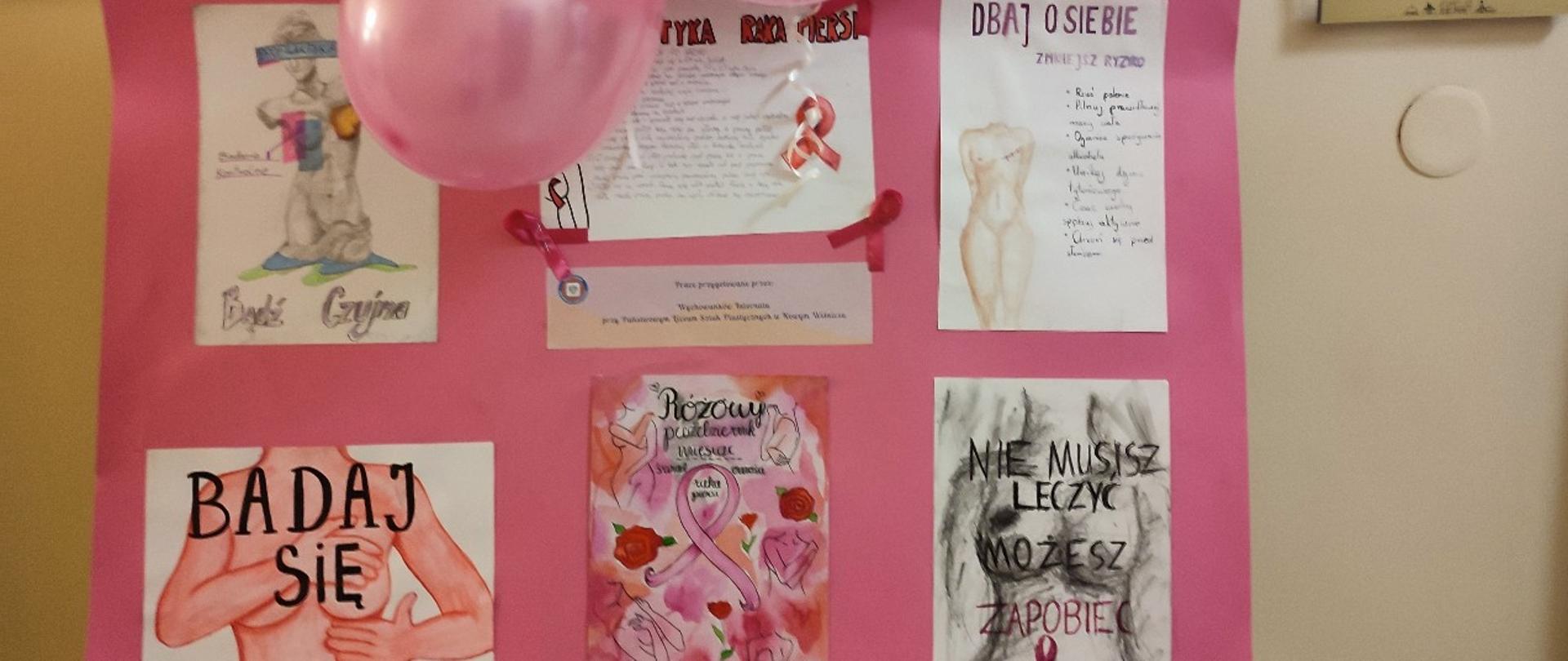 Na górze zdjęcia znajdują się balony. Pod nimi na różowym tle prace plastyczne dotyczące badania piersi. 