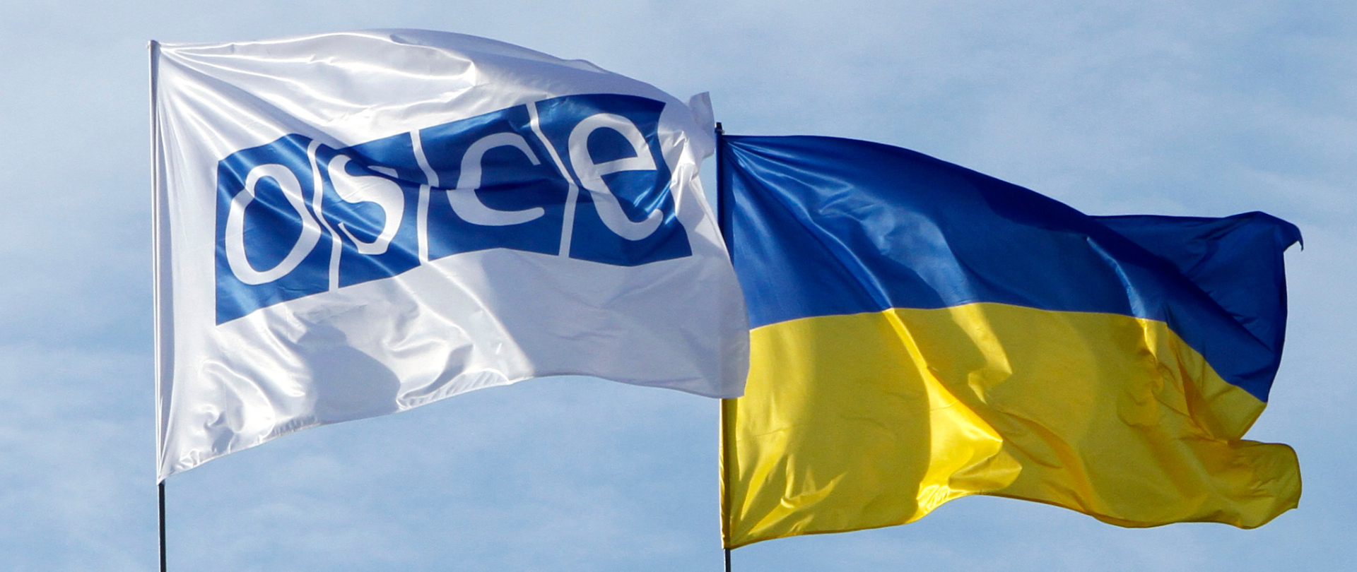 Flags of the OSCE and Ukraine