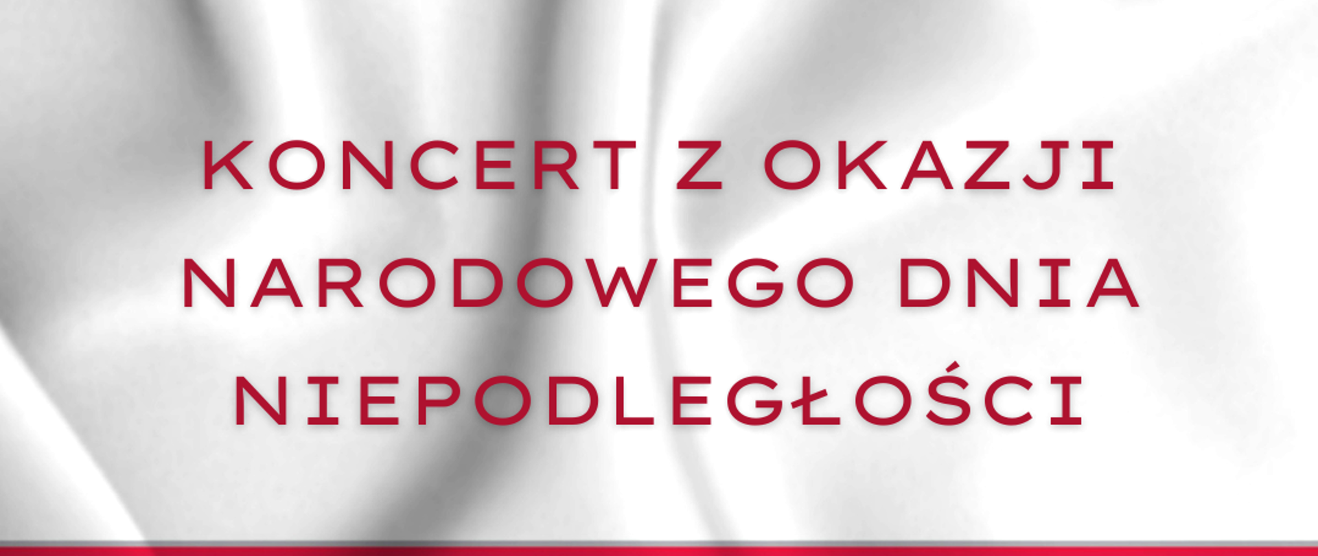 Na biało czerwonym tle napis koncert z okazji Narodowego Dnia Niepodległości