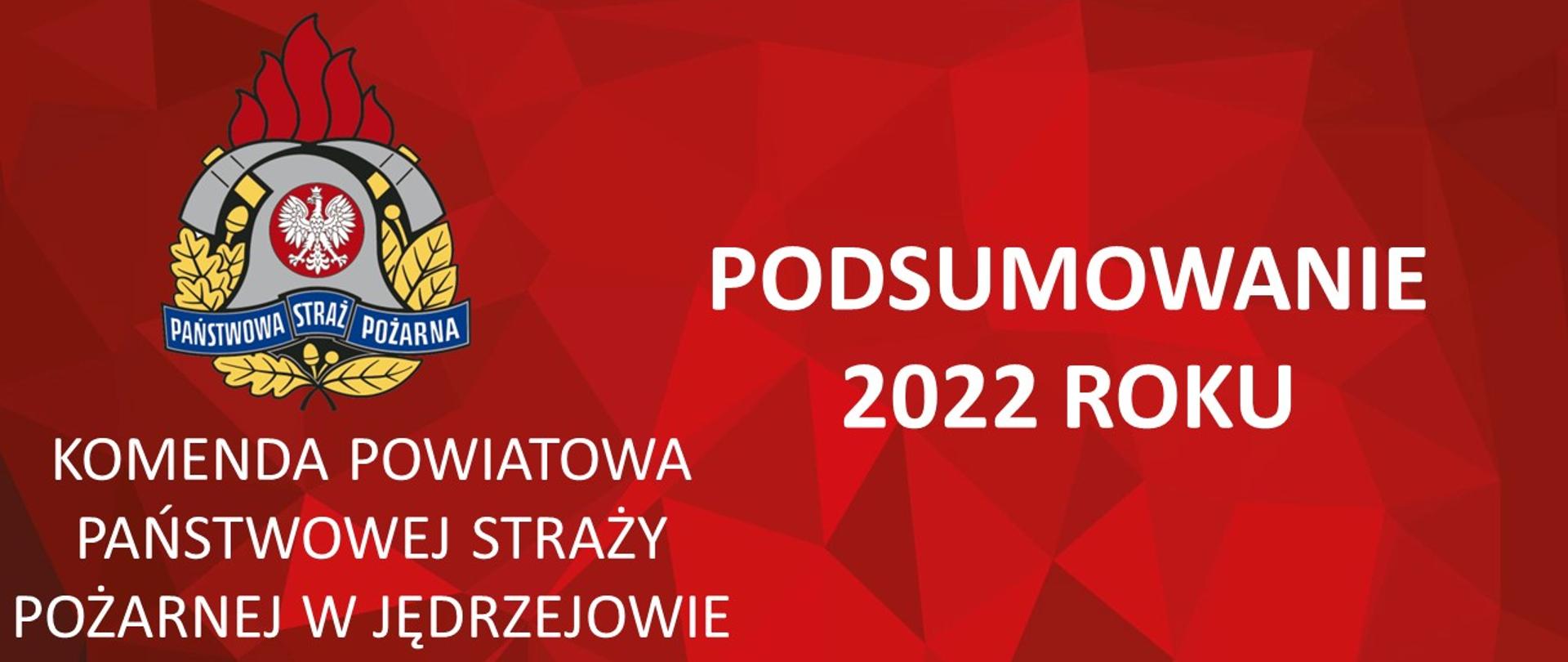 Na czerwonym tle biały napis PODSUMOWANIE 2022 ROKU oraz KOMENDA POWIATOWA PSP W JĘDRZEJOWIE wraz z logotypem PSP