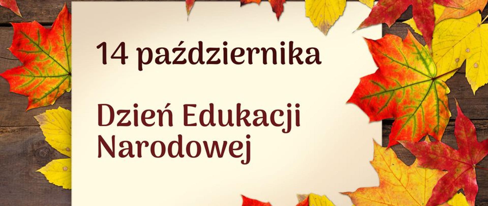 grafika z napisem "14 października Dzień Edukacji Narodowej" na tle jesiennych liści