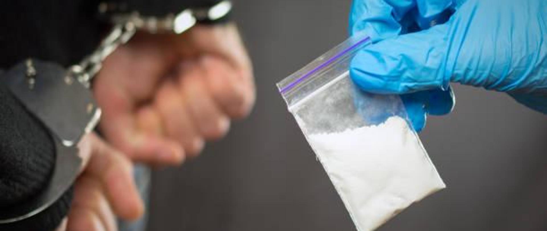 A police officer finds drugs during the search of drug dealers