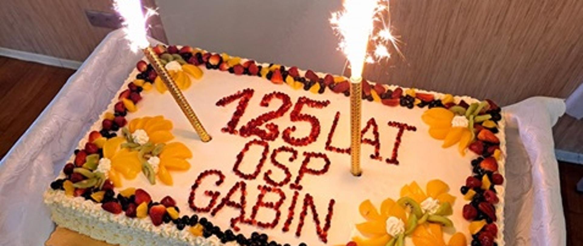 Na zdjęciu widać tort z napisem 125 lat OSP Gąbin