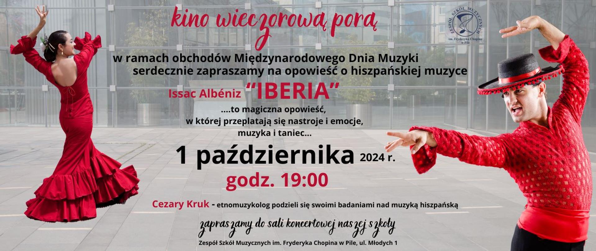 Na szarym chodniku przed szklaną ścianą po lewej stronie w czerwonej długiej sukni, z uśmiechem na twarzy, tańcząca Pani, w czarnych upiętych w kok włosach. Po prawej stronie w tańczącej pozie w czerwonej koszuli z odpiętymi mankietami, mężczyzna z czarnym kapeluszem na głowie obszytym czerwonym frędzlem.