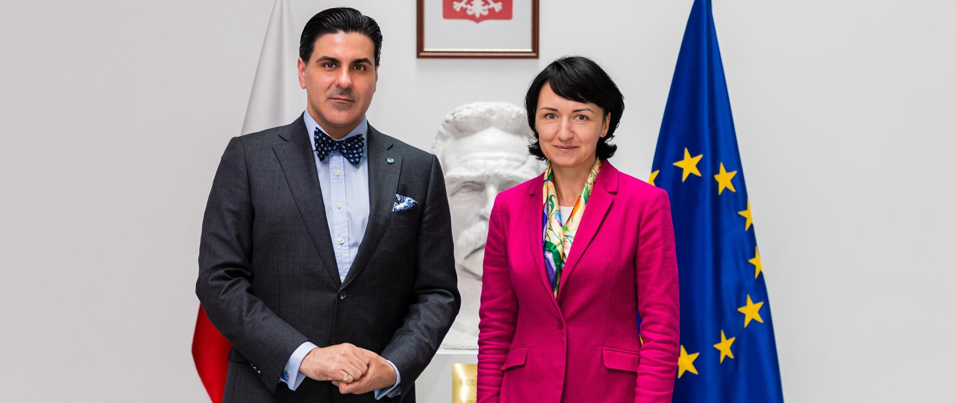 Undersecretary of State Henryka Moscicka-Dendys with the Chancellor of the International Criminal Court in The Hague, Osvaldo Zavala Giler against the background of the Polish and EU flags