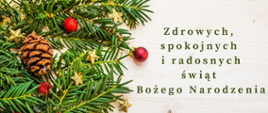 Grafika na jasnym tle, z lewej strony gałązki z igliwiem, bombkami i szyszką. Z napisem: "Zdrowych, spokojnych i radosnych świąt Bożego Narodzenia życzy dyrektor i pracownicy Szkoły Muzycznej I stopnia w Złotowie. Boże Narodzenie 2022."