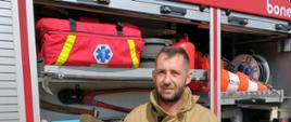 Strażak ratownik Mariusz TOMANEK z jednostki OSP KSRG Cisowa podczas działań ratowniczych na terenie kanału Gliwickiego. 