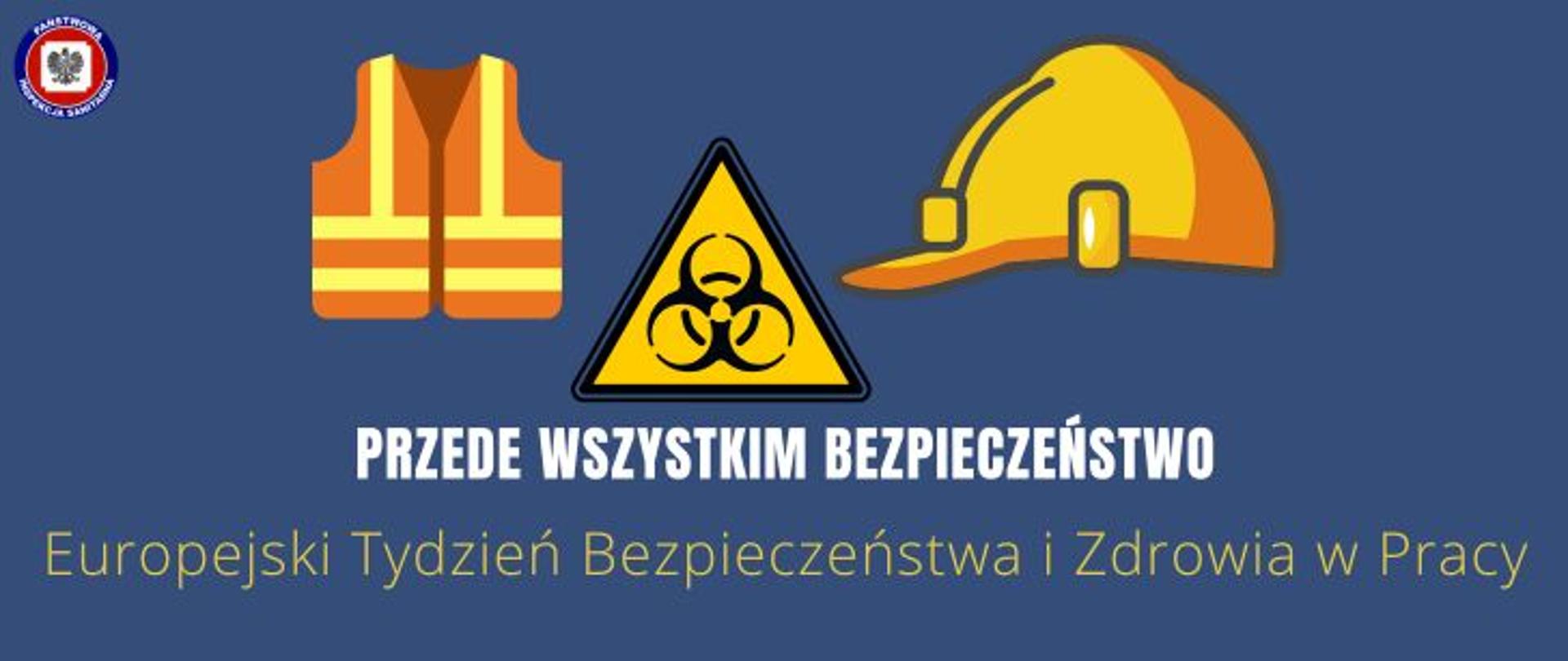 Na granatowym tle, od góry kamizelka ochronna, znak Biohazard, żółty kask, poniżej jasny napis Przede Wszystkim Bezpieczeństwo, niżej żółty napis Europejski Tydzień Bezpieczeństwa i Zdrowia w Pracy. W lewym górnym rogu logo Państwowej Inspekcji Sanitarnej.