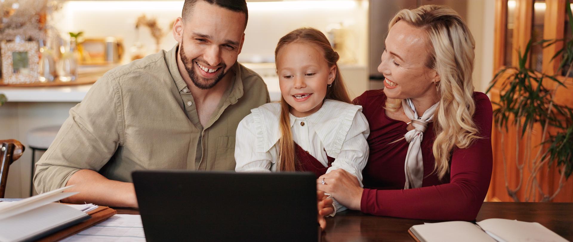 Parents, girl and happy in home on laptop with subscription for cartoons, movies or entertainment. .