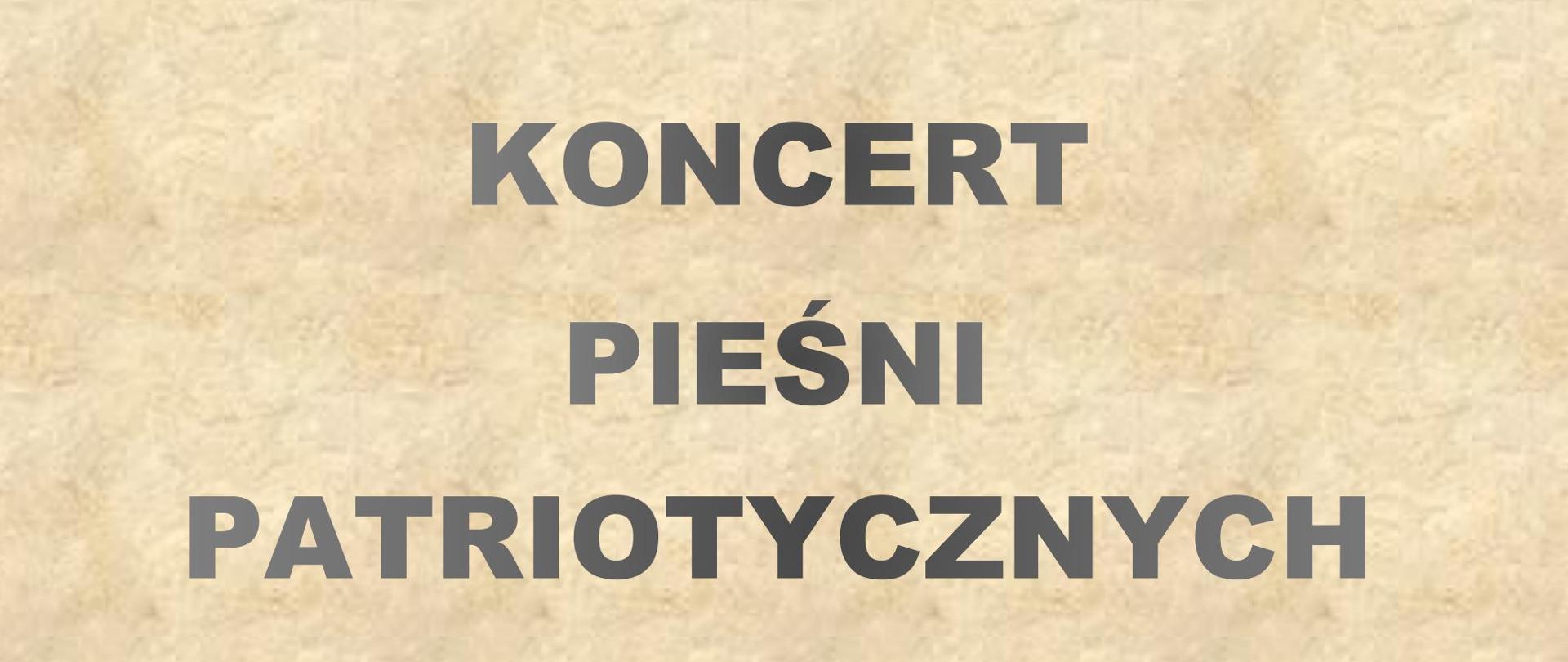 Na tle imitującym zżółkły papirus, w ramce czarno-brązowo-czerwonej tekst: Koncert Pieśni Patriotycznych. Poniżej flaga Polski o przybrudzonych kolorach. Dale w dół tekst: 15 listopada 2024 godz. 18.30. Wystąpią uczniowie Państwowej Szkoły Muzycznej im. Emila Młynarskiego w Augustowie pod kierunkiem Katarzyny Nikolopoulou i Marty Kaczan. Akompaniament Grzegorz Sobczak. Państwowa Szkoła Muzyczna, ul. Wybickiego 1 Sala koncertowa.