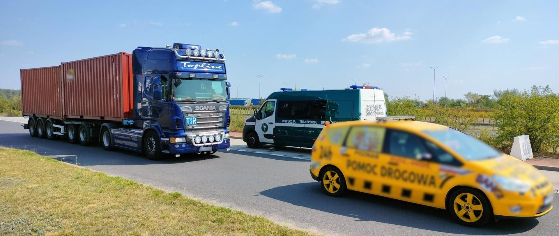 Na zdjęciu widoczny sprawdzany pojazd oraz pojazd inspekcji i pomocy drogowej.