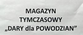 Tekst na białym tle o treści: MAGAZYN TYMCZASOWY "Dary Dla Powodzian"