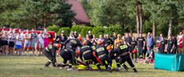 Zdjęcie przedstawia przebieg konkurencji „Ćwiczenie bojowe” wykonywane przez drużynę OSP
