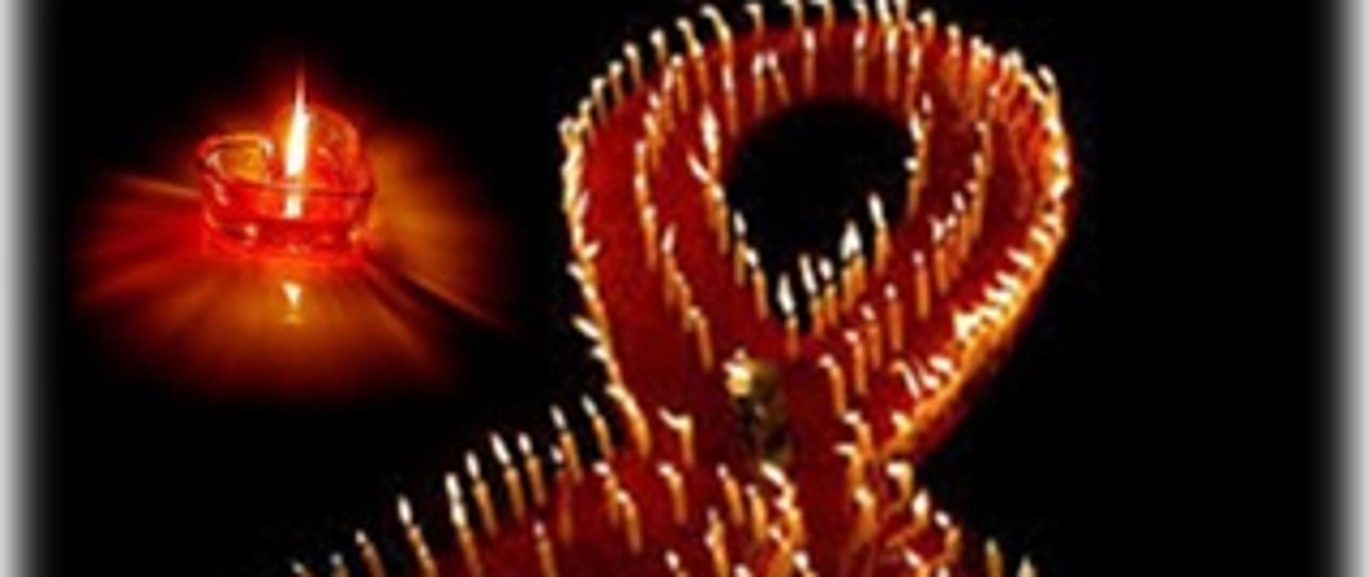Ułożona wstążka ze świeczek, upamiętniająca osoby,które zmarły na AIDS